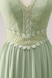 Green A-Line Spaghetti Straps Ruffled Floral Long Bridesmaid Dress with Lace